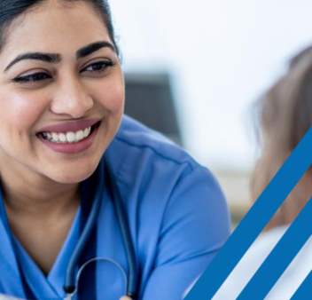 Doctor (woman) smiling at patient